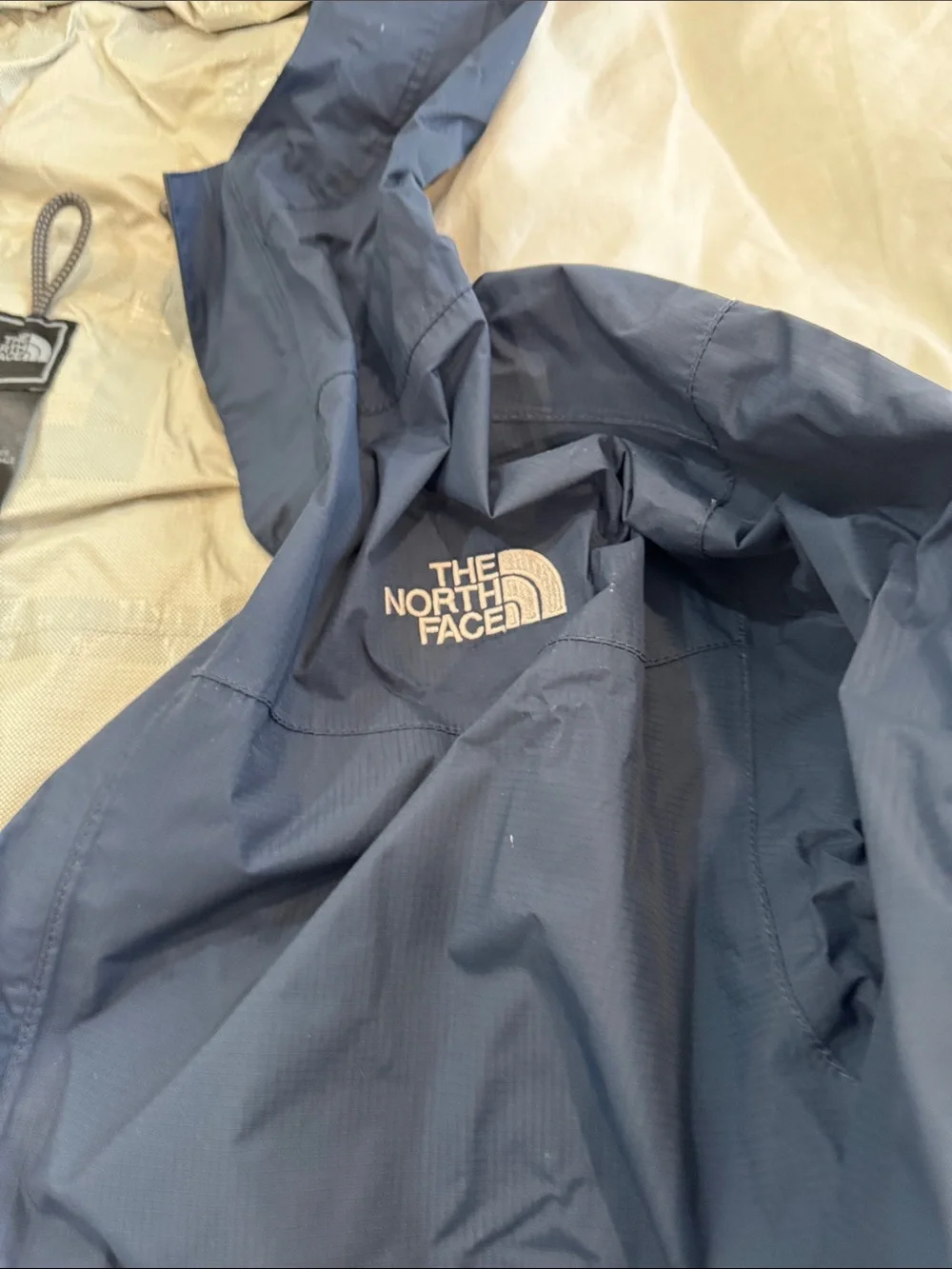 The North Face Men’s Navy Blue Hooded Rain Resistant Jacket